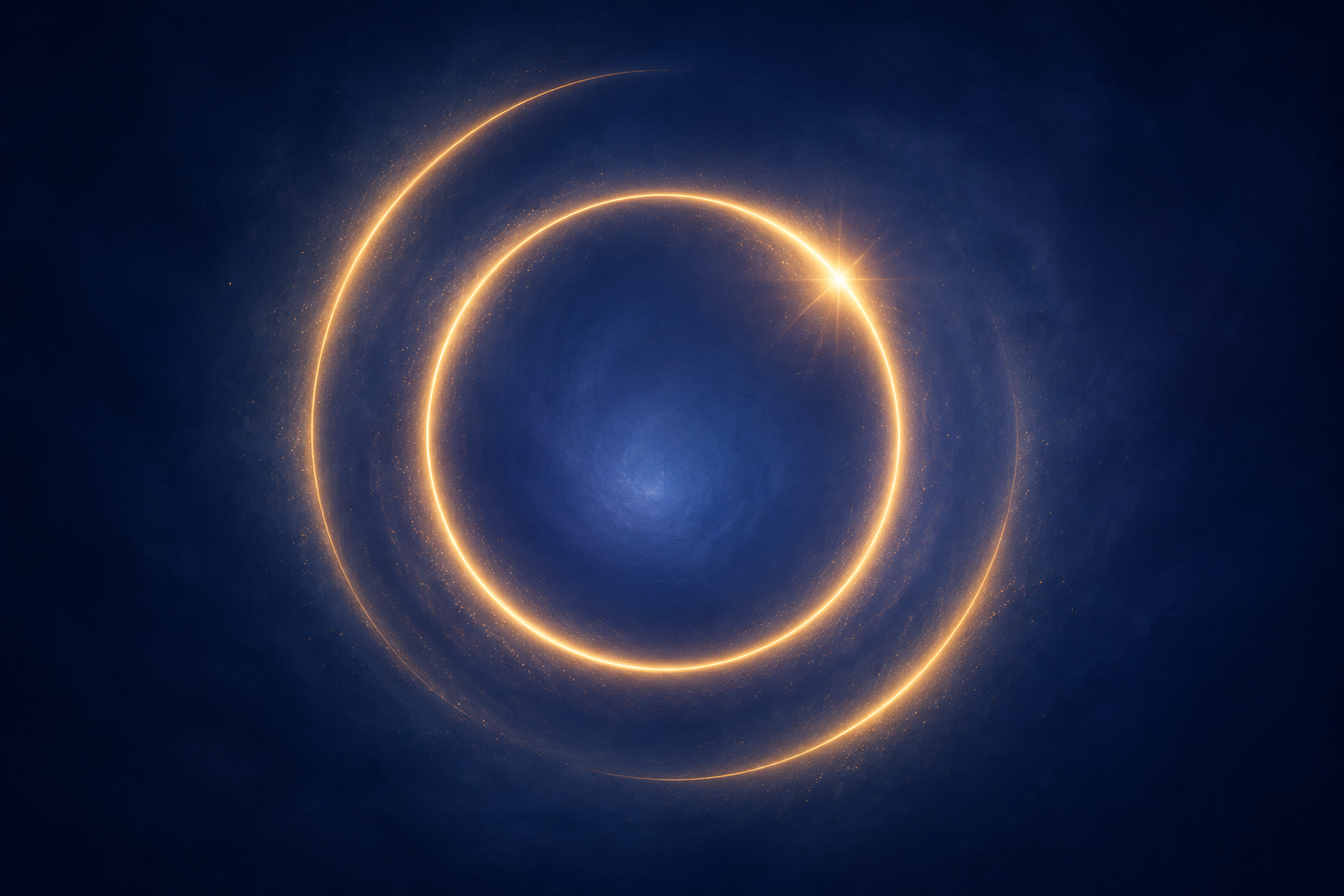 Two soft rings of golden light, one gently completing its circle and another beginning to open beyond it, held in balance within a calm indigo field, a sense of renewal and harmony